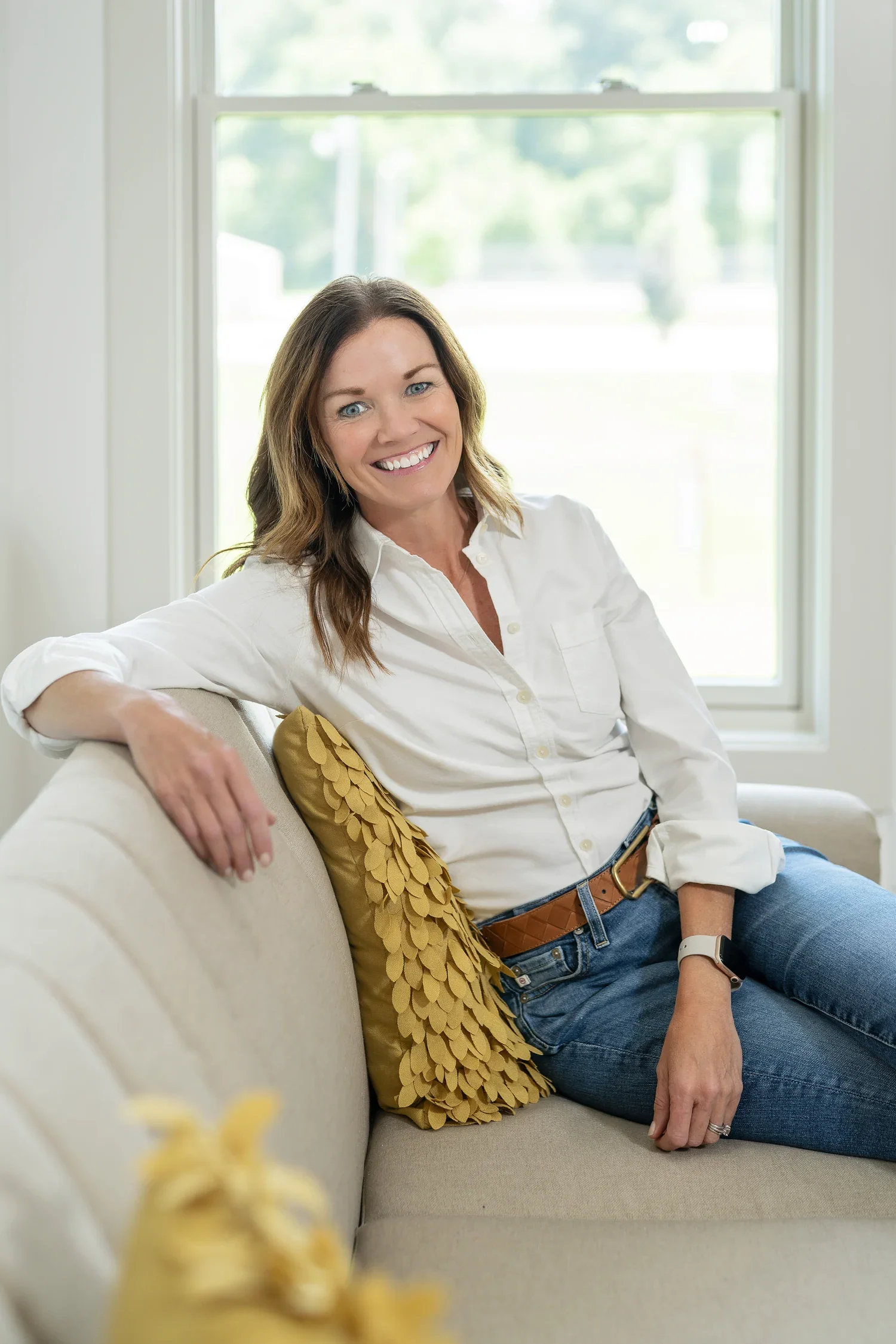 Anne M. Steele smiling at home
