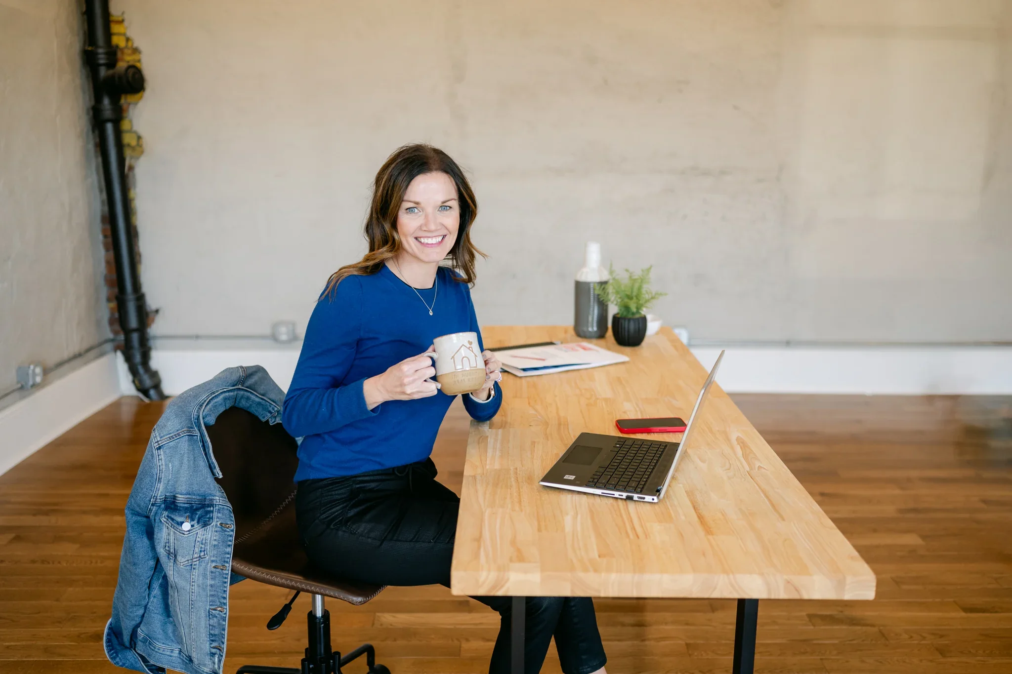 Anne M. Steele reviewing home options at her workspace