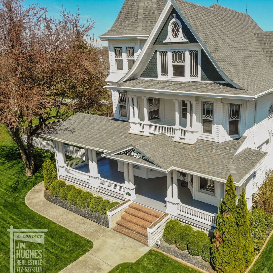 White home with a welcoming front porch